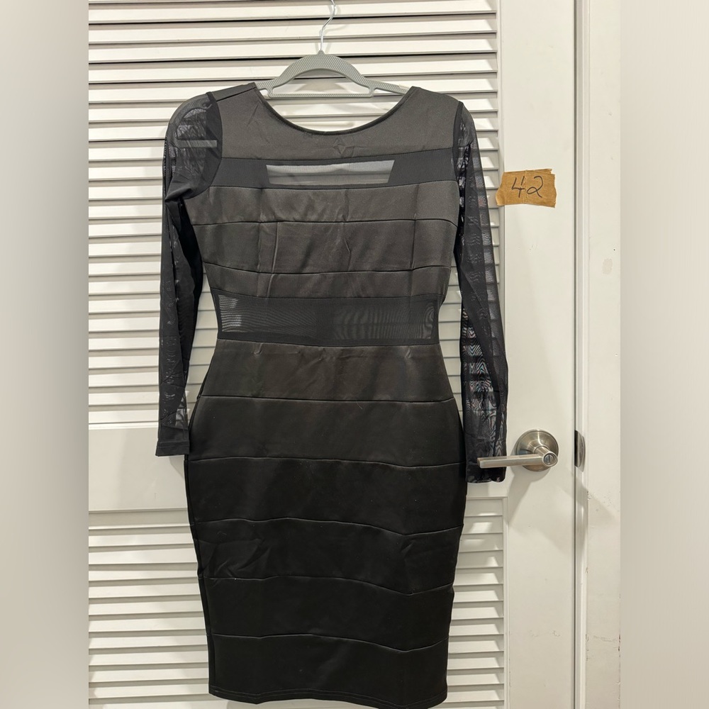 Woman’s little black dress size small. No tags